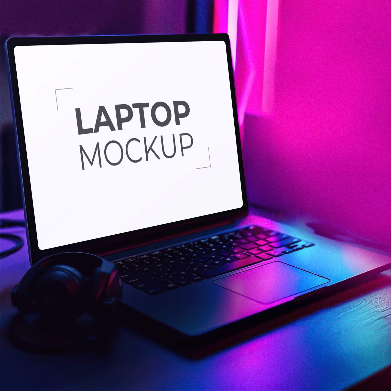 Dark Laptop On A Desk Mockup PSD (Free)